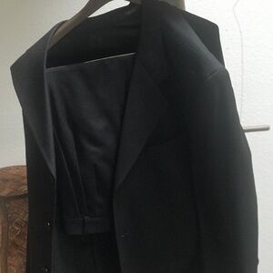 Two piece suit. Like new. Worn twice.